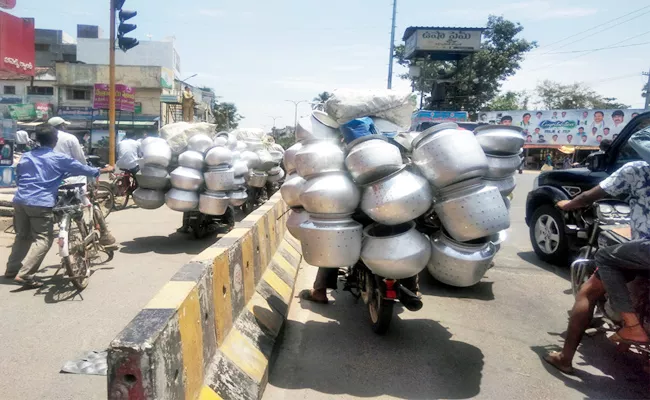 Two Wheelers Going With Overload In Anakapalle, Visakapatnam - Sakshi