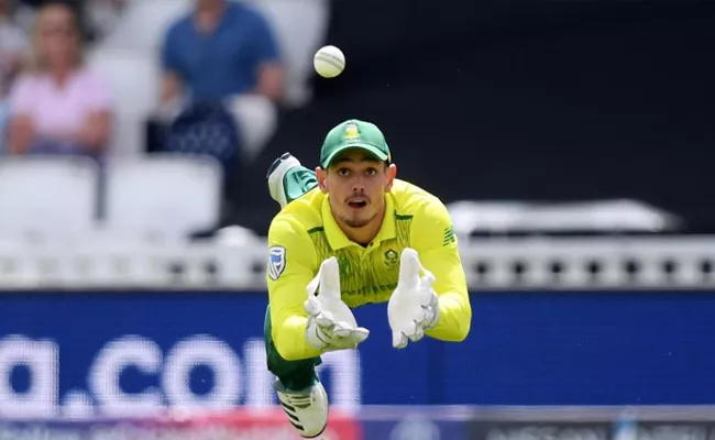 Quinton de Kock dives forward and claims a catch - Sakshi