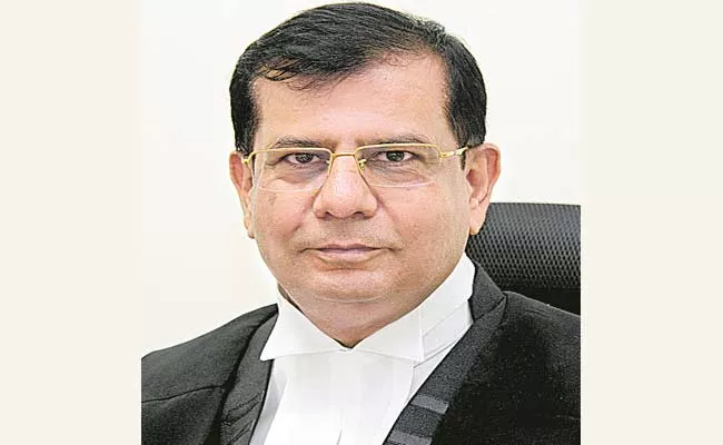 Justice Raghvendra Singh Chauhan Appointed As Telangana High Court CJ - Sakshi