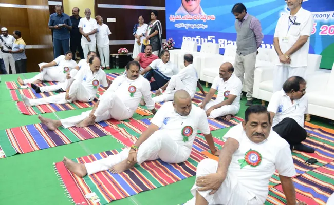 Yoga day Celebration By Aayush In Vijayawada - Sakshi