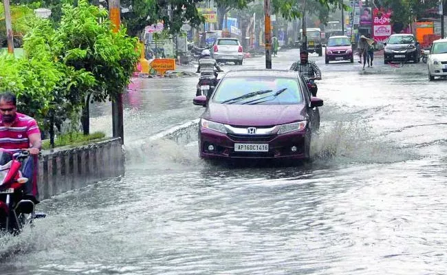 Heavy Rains In Vijayawada - Sakshi