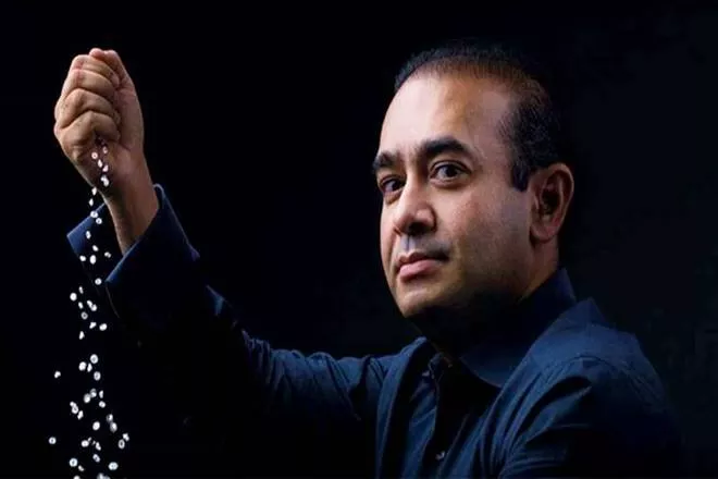  Swiss authorities freeze bank accounts of Nirav Modi, sister Purvi Modi worth Rs 283 crore - Sakshi