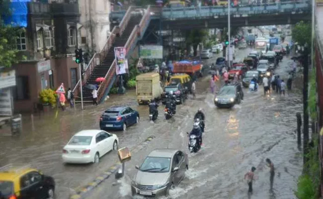 Mumbai Waterlogged After Heavy Rain - Sakshi