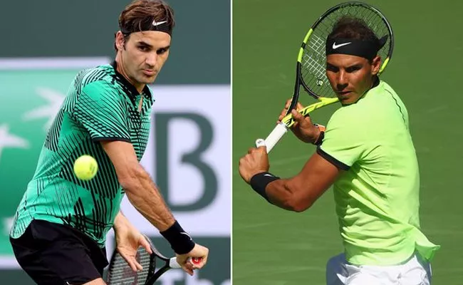 Roger Federer And  Rafael Nadal  reach French Open quarterfinals - Sakshi