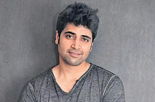 Adivi Sesh Evaru Movie Title Poster - Sakshi