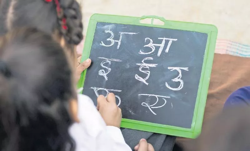 education policy panel drops Hindi as must language - Sakshi