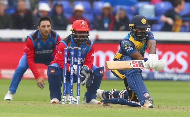 Srilanka Set Target of 202 Runs Against Afghanistan - Sakshi