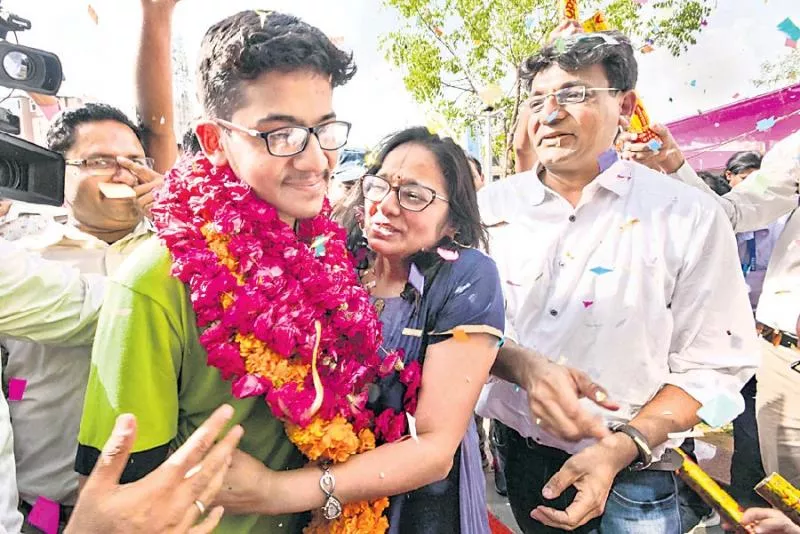 Nalin Khandelwal from Kota tops with 701 marks - Sakshi