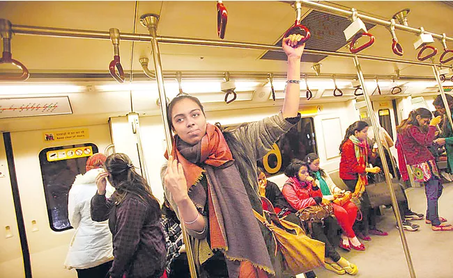 Women counter Arvind Kejriwal decision to make Metro bus rides free - Sakshi