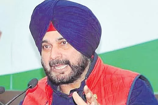 Navjot Sidhu loses local bodies ministry, gets power - Sakshi