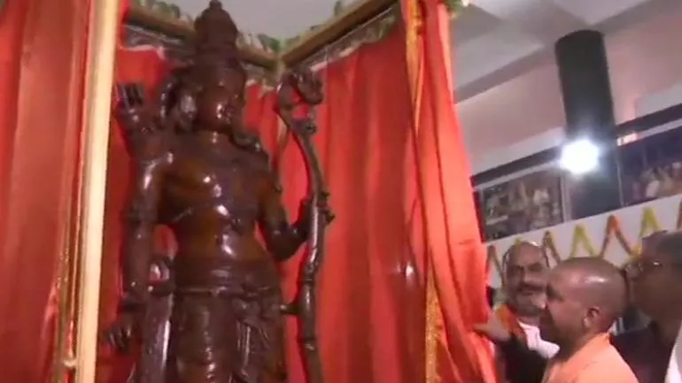 Yogi Adityanath Unveils 7 Feet Tall Rosewood Statue Of Lord Ram in Ayodhya - Sakshi