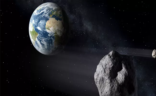 Asteroids May Hit Earth This Century - Sakshi