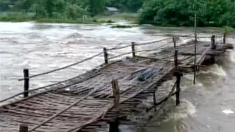 Brahmaputra River Crosses Danger Mark Due To Assam Floods   - Sakshi