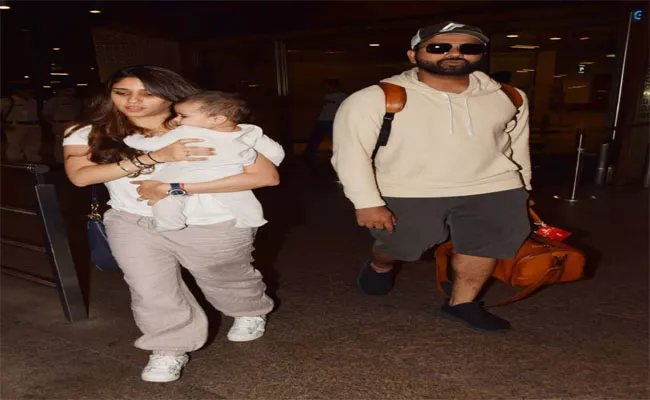 Cricketer Rohit Sharma has Returned to India with his Family - Sakshi