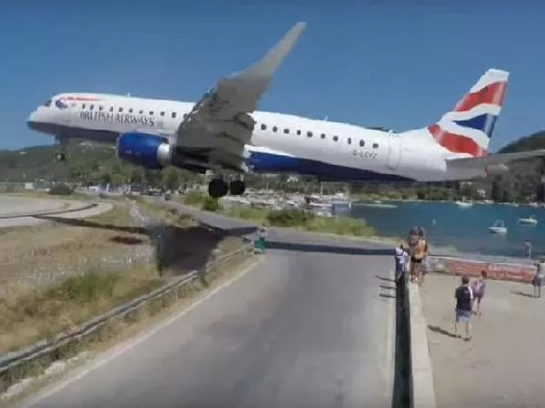 Plane Landing Just a Few Feet Away from Tourists In Greece - Sakshi