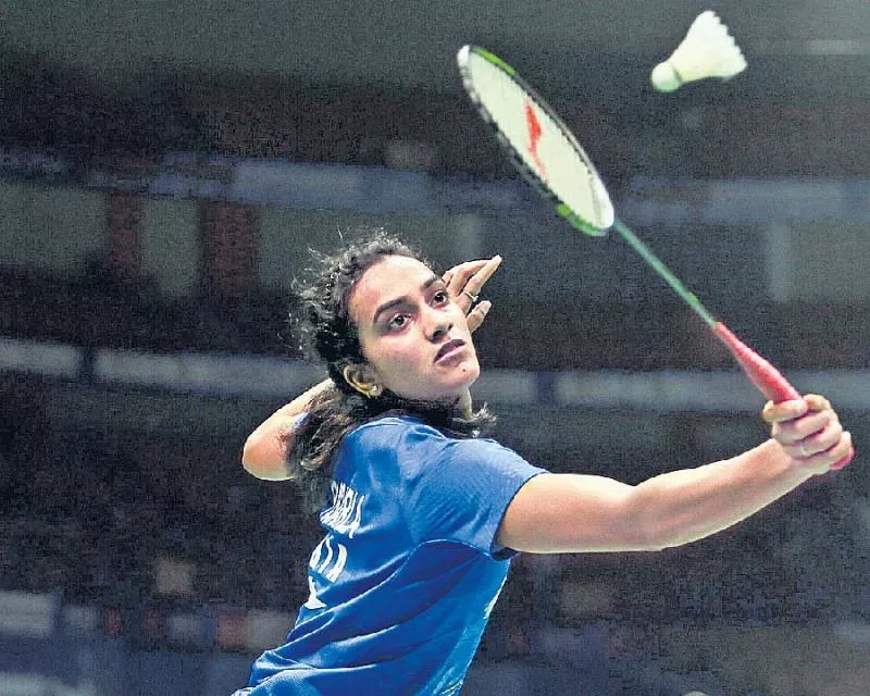 PV Sindhu, Kidambi Srikanth enter 2nd round of Indonesia Open - Sakshi