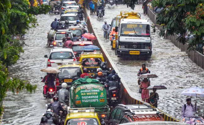 Heavy Rains Lead to Wall Collapse in Pune, Mumbai, Kalyan - Sakshi