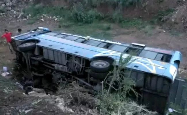 Bus with 25 passengers Over turned in Vizianagaram - Sakshi