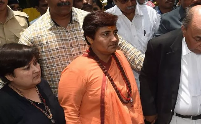 JP Nadda pulls up Sadhvi Pragya - Sakshi