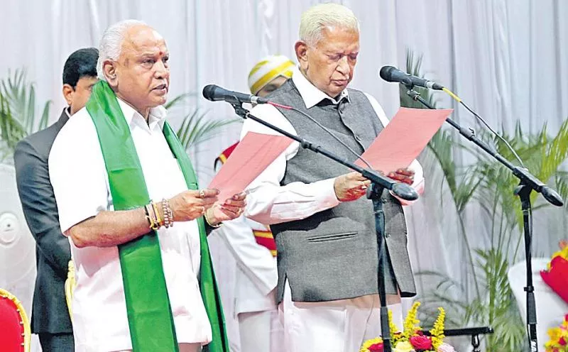 BS Yediyurappa takes oath as 25th chief minister of Karnataka - Sakshi