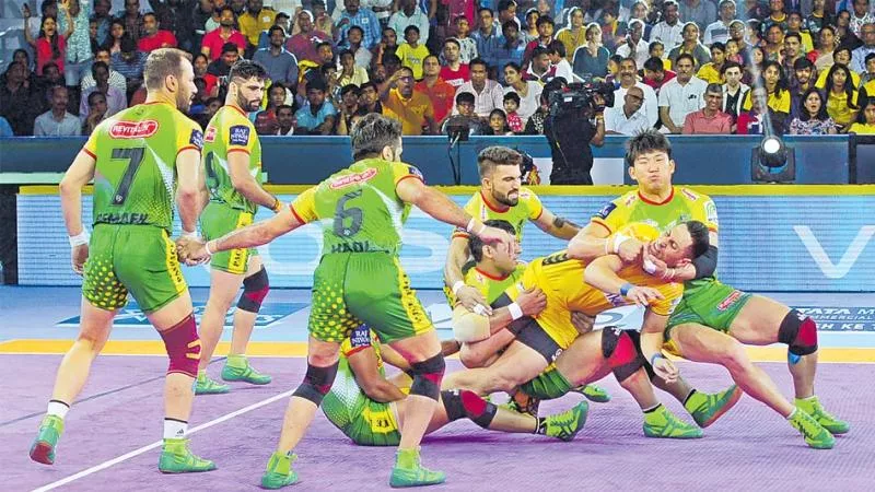 Patna Pirates Beat Telegu Titans - Sakshi