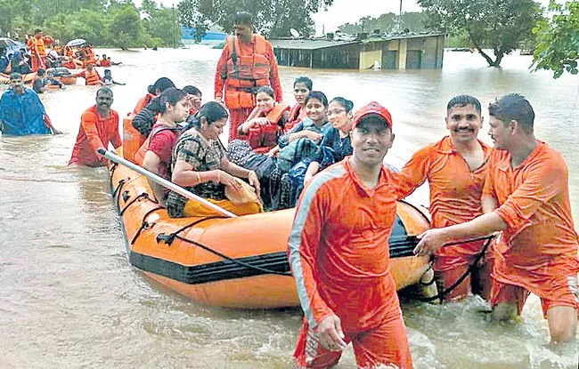 Mahalaxmi Express in flood in 17 hours - Sakshi