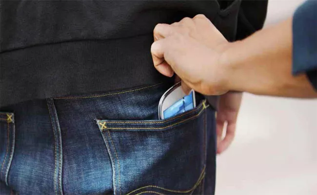 Increasing Mobile theft In Eluru - Sakshi