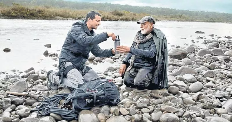 Narendra Modi is surprise guest on Bear Grylls Man vs Wild - Sakshi