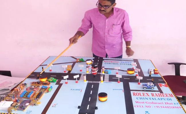 A Man Discovered Automatic Traffic Control System In West Godavari - Sakshi