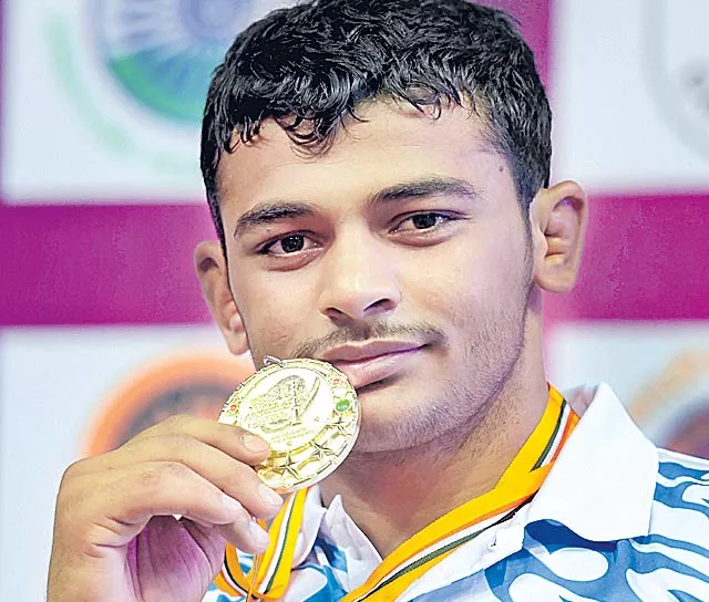 Deepak Punia becomes 1st Indian junior world champion in 18 years - Sakshi