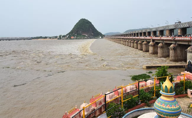 Prakasam Barrage Opens All 70 Gates Lifted To Prevent Flooding - Sakshi