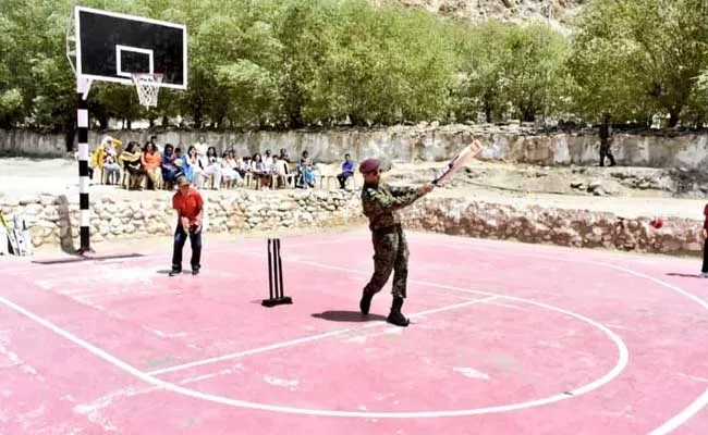 Lieutenant Colonel MS Dhoni Batting In Basketball Ground In Leh - Sakshi