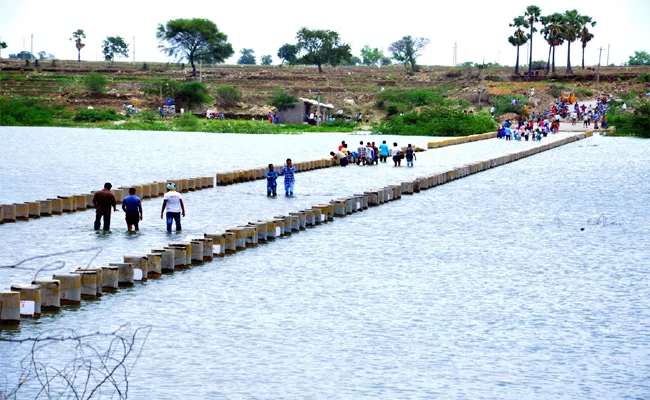 Breaches Everywhere By The Krishna River - Sakshi