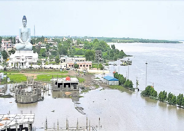 People stuck in Krishna river flood - Sakshi