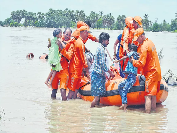 Lanka villages in flood water - Sakshi