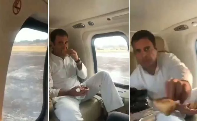 Rahul Gandhi Eating Samosa At Kerala Floods Visiting - Sakshi