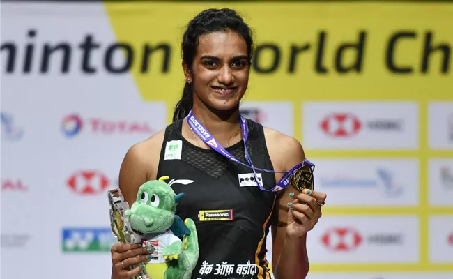 Modi Congratulates PV Sindhu For Winning BWF World Championships - Sakshi