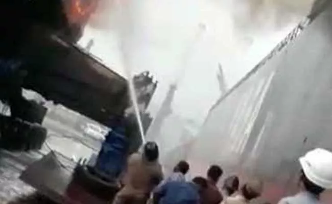 Fire Accident In Visakha Port - Sakshi