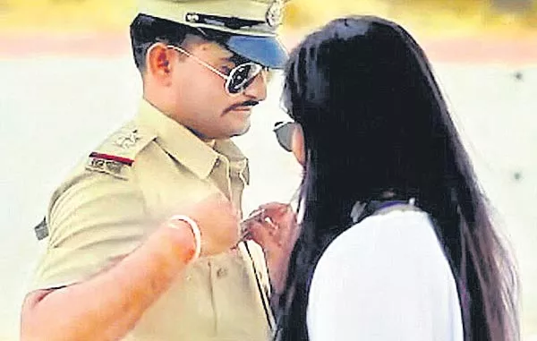 Accepting bribe from fiancee in pre-wedding video lands Rajasthn - Sakshi