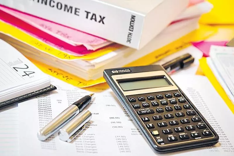 Expert panel submits report on replacing I-T Act with direct tax code - Sakshi