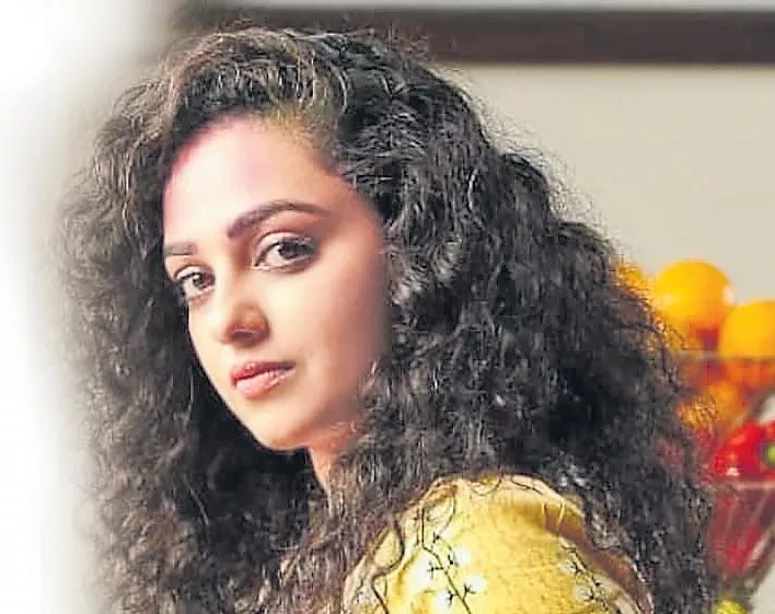 Shine Tom Chacko and Nithya Menen film is titled Aaram Thirukalpana - Sakshi