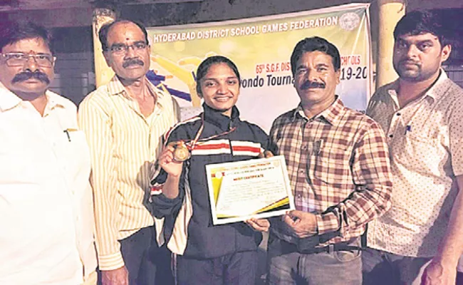 Chandana Gets Gold Medal In SGF Championship - Sakshi