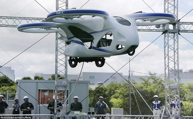 Future Flying Car Displayed By NEC Company in Tokyo - Sakshi