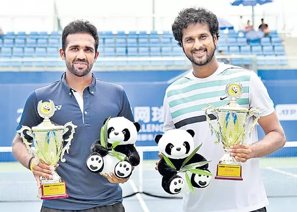 Saketh Myneni win doubles title - Sakshi