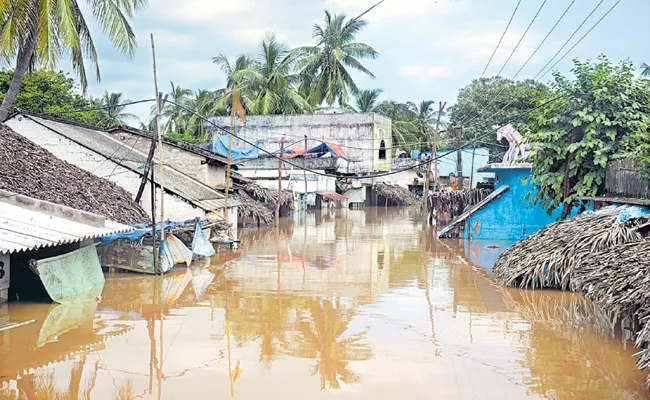 Huge Flood in coastal villages of Godavari districts  - Sakshi