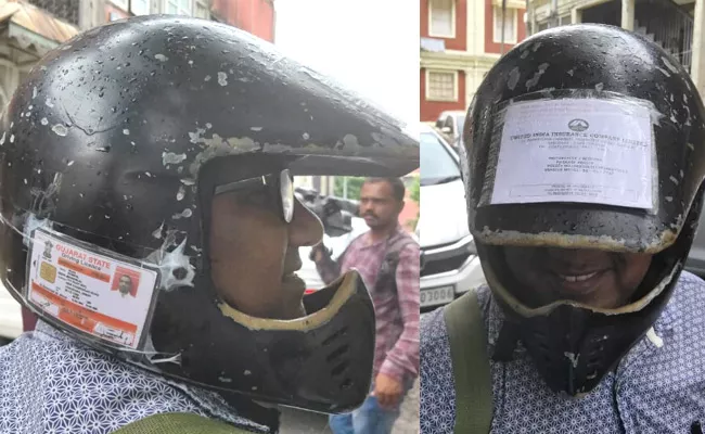 Motor Vehicle Act Vadodara Man Pastes All Bike Documents on Helmet - Sakshi