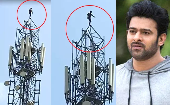 Jangam Youth Climbs Cellphone Tower For Prabhas - Sakshi