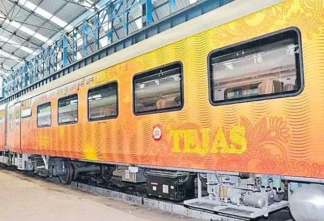 Free travel insurance of Rs 25 lakh each for passengers on board Express - Sakshi