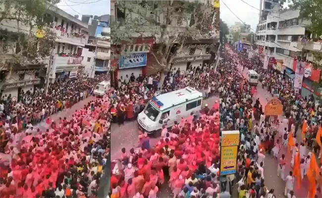 Devotees Making way for an Ambulance during Ganesh Visarjan, Viral Video - Sakshi