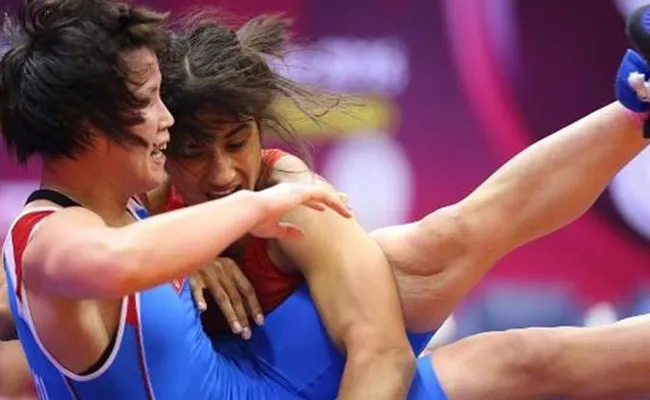 Vinesh Phogats World Wrestling Title Hopes End - Sakshi